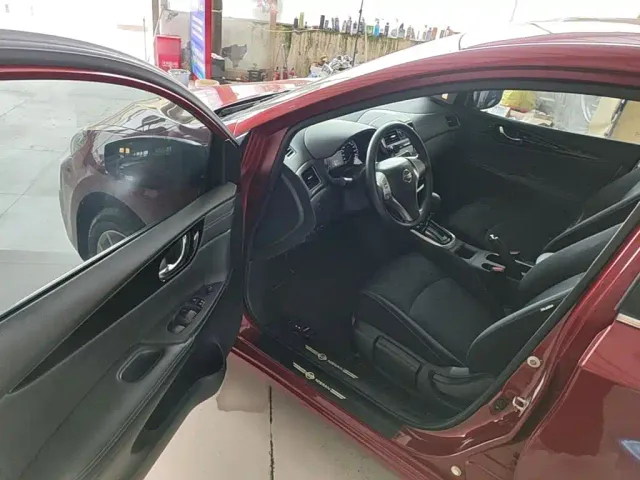 Nissan Tiida — Фото автомобиля 15