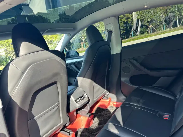 Tesla Model Y — Фото автомобиля 7