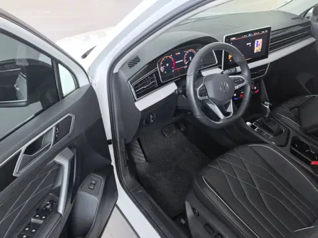 Volkswagen Tiguan L — Фото автомобиля 11