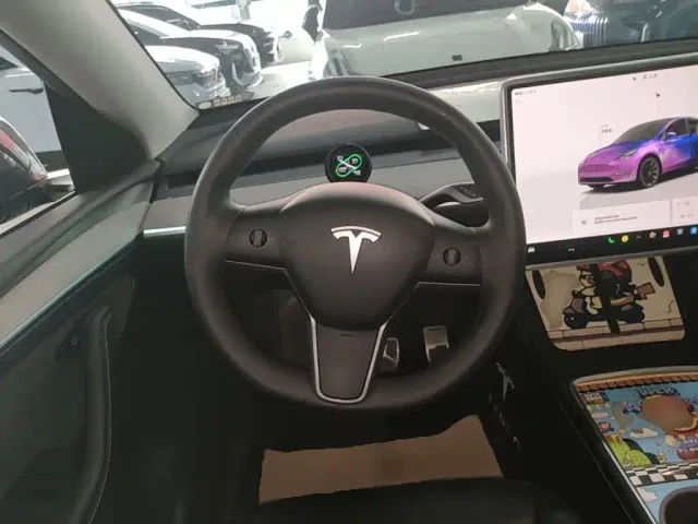 Tesla Model Y — Фото автомобиля 10