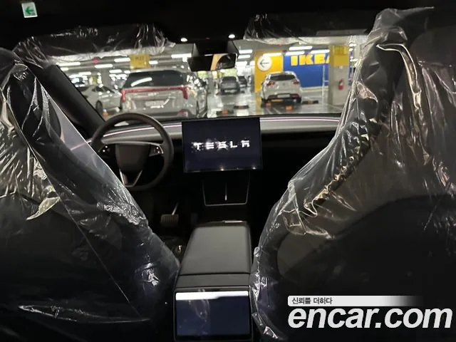 Tesla Model Y — Фото автомобиля 12