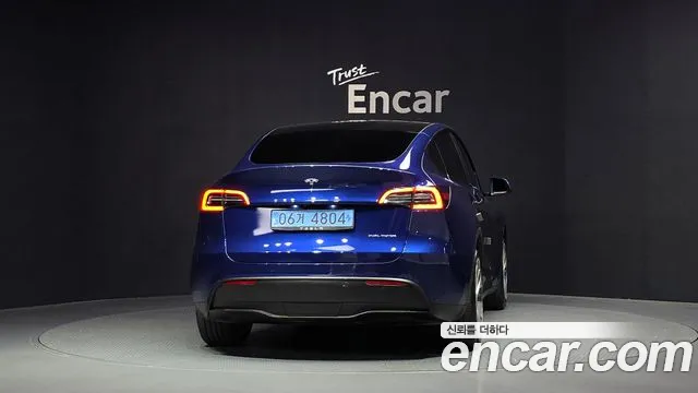 Tesla Model Y — Фото автомобиля 4