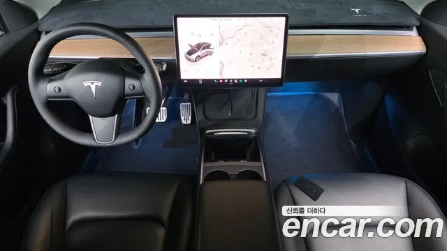Tesla Model Y — Фото автомобиля 10