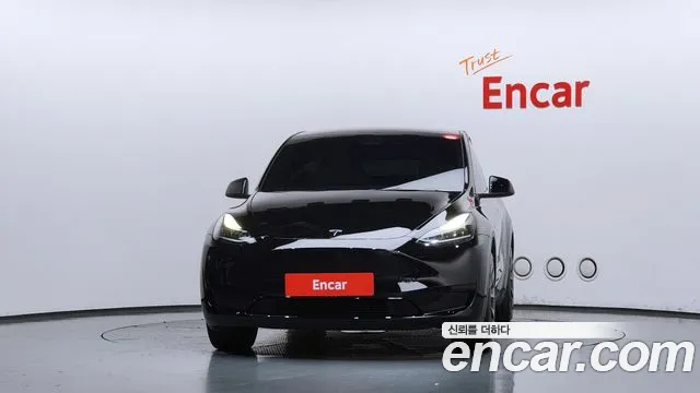 Tesla Model Y — Фото автомобиля 3