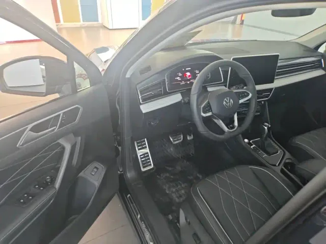 Volkswagen Tiguan L — Фото автомобиля 15