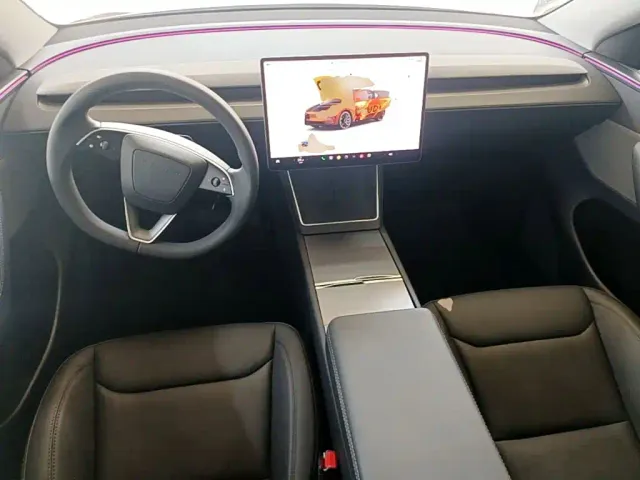 Tesla Model Y — Фото автомобиля 9