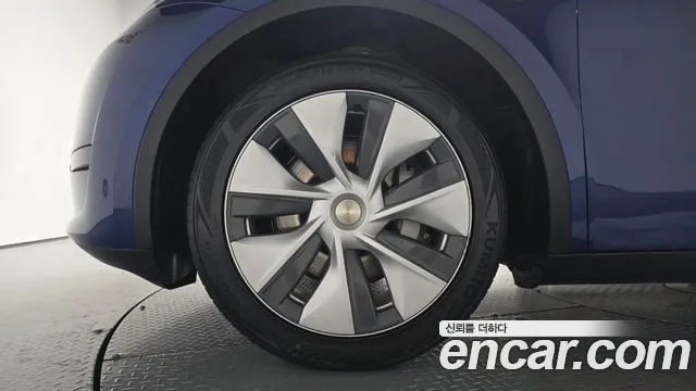 Tesla Model Y — Фото автомобиля 5
