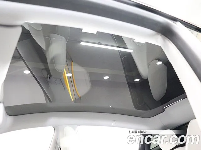 Tesla Model Y — Фото автомобиля 18
