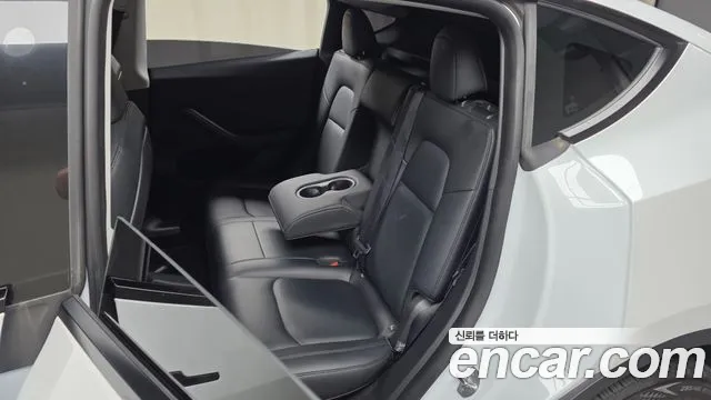 Tesla Model Y — Фото автомобиля 10