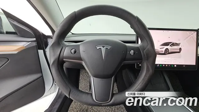 Tesla Model 3 — Фото автомобиля 13