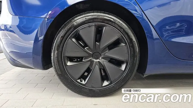 Tesla Model 3 — Фото автомобиля 5