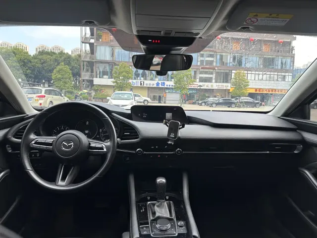 Mazda Axela — Фото автомобиля 23