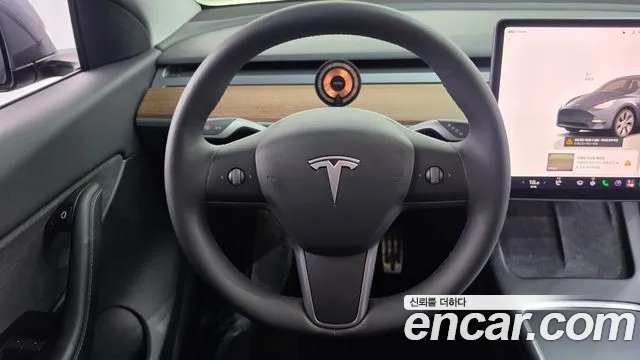 Tesla Model Y — Фото автомобиля 19