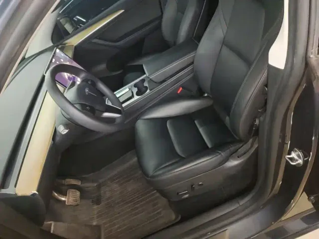 Tesla Model Y — Фото автомобиля 14
