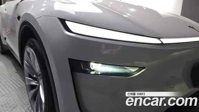 Tesla Model Y — Фото автомобиля 22