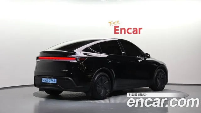 Tesla Model Y — Фото автомобиля 2