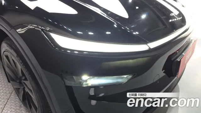 Tesla Model Y — Фото автомобиля 7