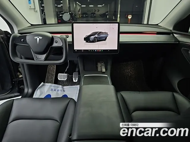 Tesla Model Y — Фото автомобиля 7