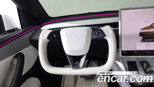 Tesla Model Y — Фото автомобиля 19