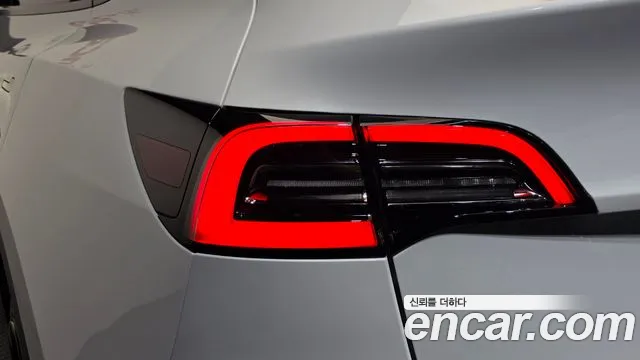 Tesla Model Y — Фото автомобиля 7