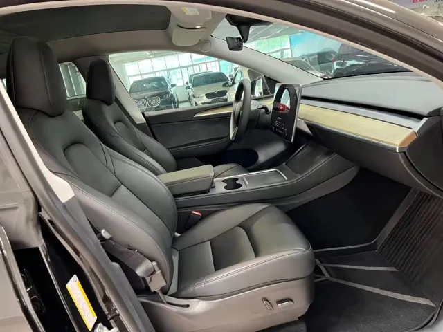 Tesla Model Y — Фото автомобиля 7