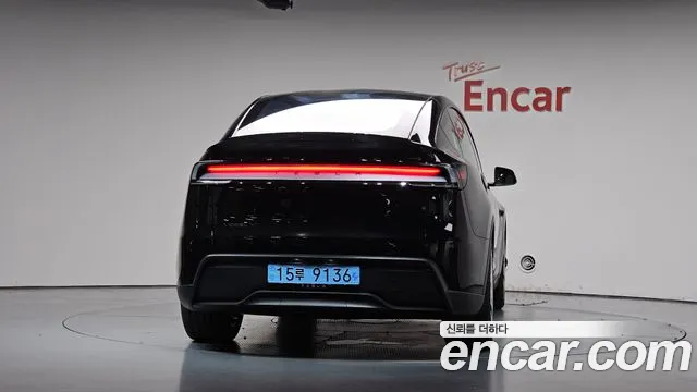 Tesla Model Y — Фото автомобиля 3