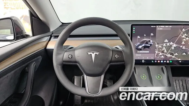 Tesla Model Y — Фото автомобиля 13
