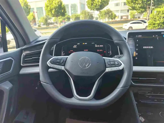 Volkswagen Tiguan L — Фото автомобиля 11