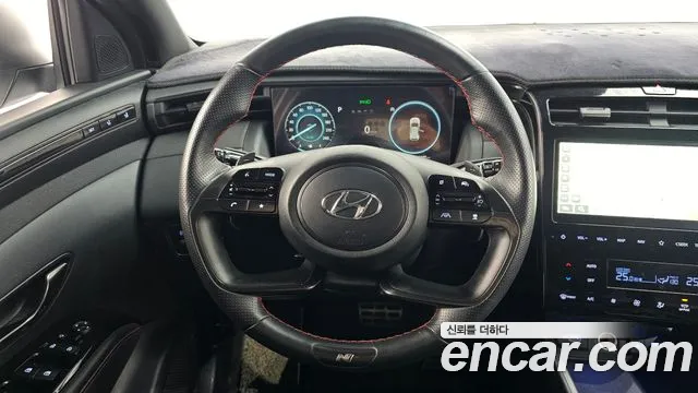 Hyundai Tucson Tucson (NX4) Бензин 1.6 Turbo 4WD — Фото автомобиля 13