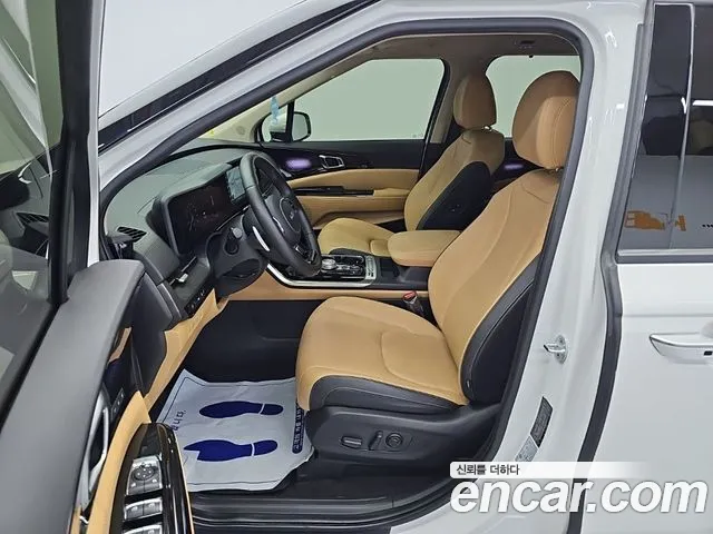 Kia Carnival Generation 4 — Фото автомобиля 11