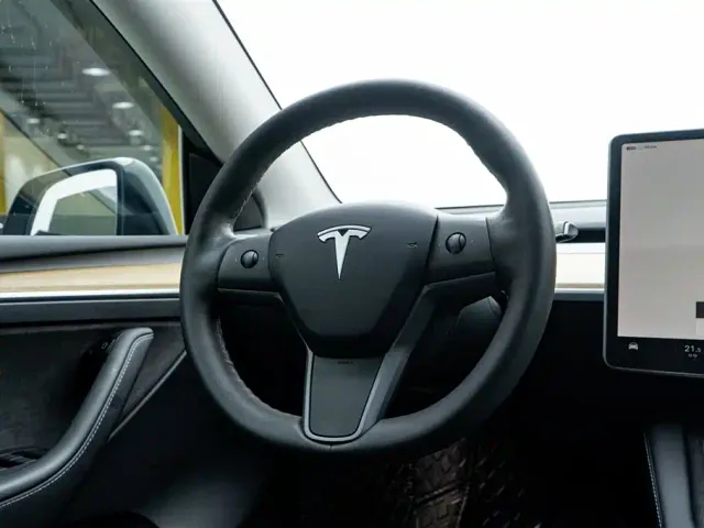 Tesla Model Y — Фото автомобиля 7