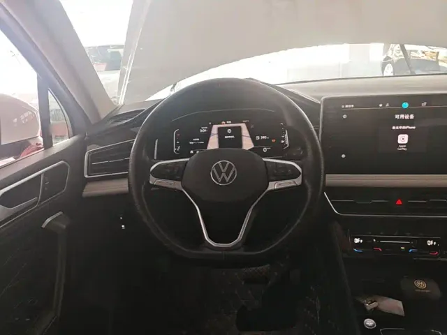 Volkswagen Tiguan L — Фото автомобиля 10