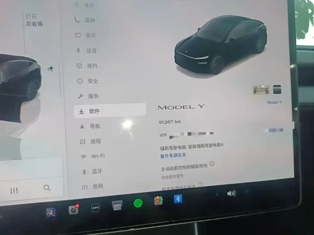 Tesla Model Y — Фото автомобиля 11
