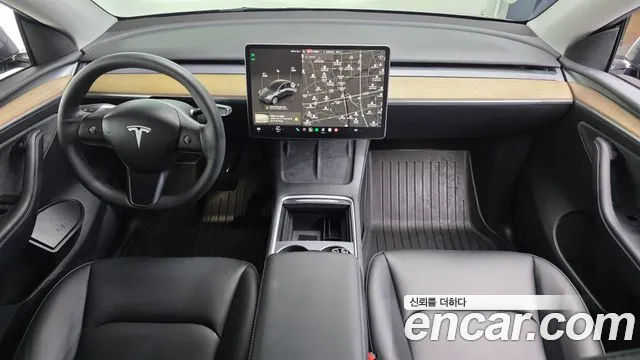 Tesla Model Y — Фото автомобиля 7