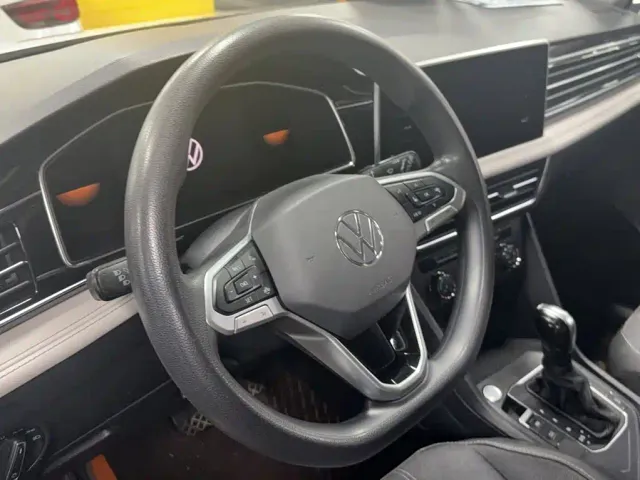 Volkswagen Tiguan L — Фото автомобиля 4