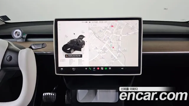 Tesla Model Y — Фото автомобиля 11