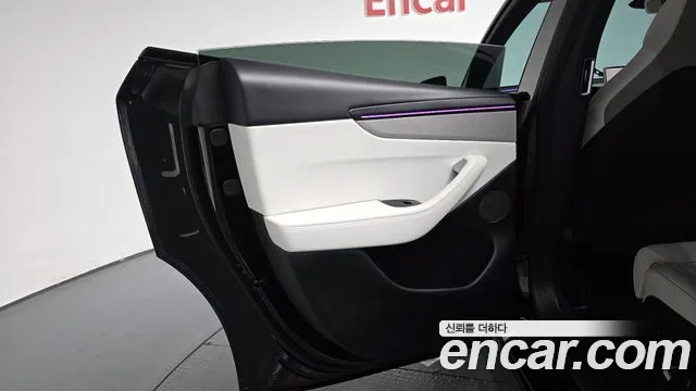 Tesla Model Y — Фото автомобиля 14