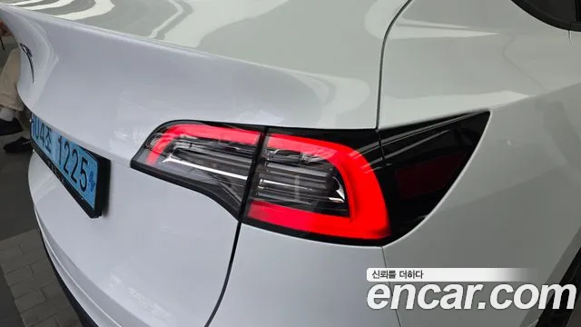 Tesla Model Y — Фото автомобиля 22