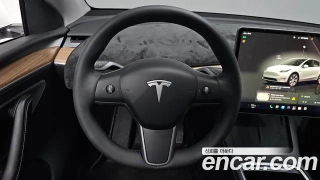 Tesla Model Y — Фото автомобиля 19