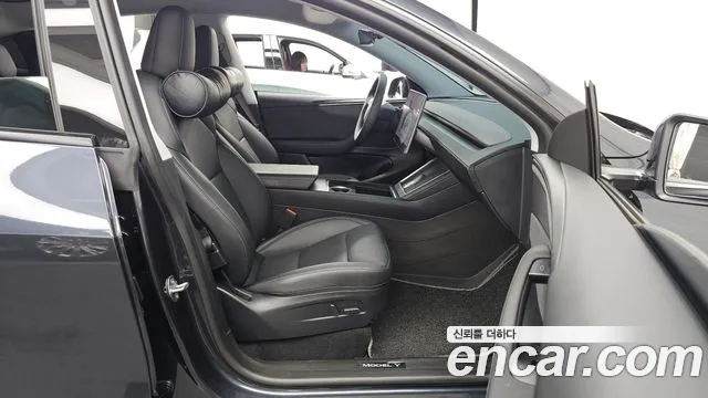 Tesla Model Y — Фото автомобиля 11