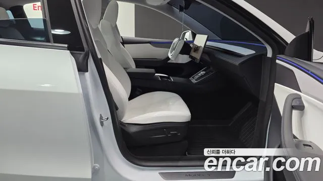 Tesla Model Y — Фото автомобиля 26
