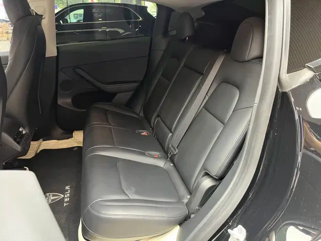 Tesla Model Y — Фото автомобиля 12