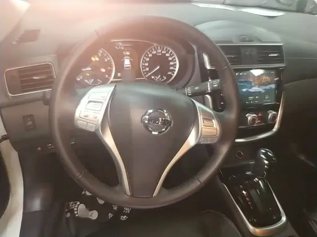 Nissan Tiida — Фото автомобиля 10