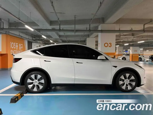 Tesla Model Y — Фото автомобиля 7