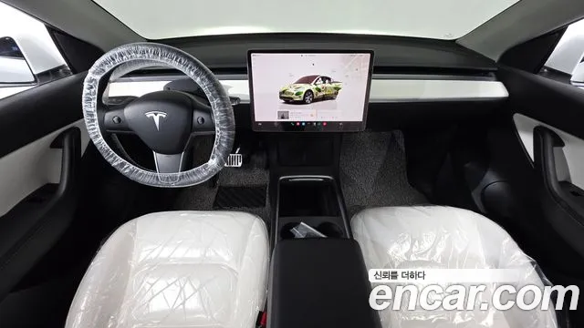 Tesla Model Y — Фото автомобиля 10