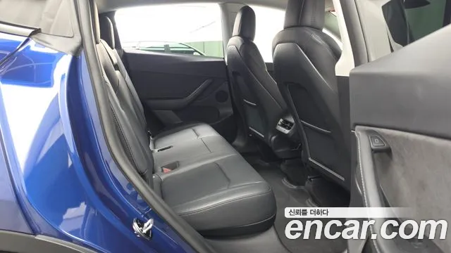 Tesla Model Y — Фото автомобиля 18