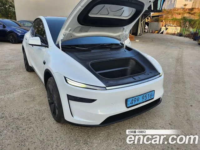 Tesla Model Y — Фото автомобиля 5