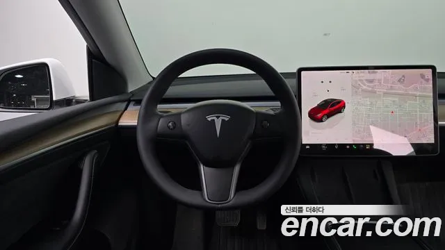 Tesla Model Y — Фото автомобиля 12
