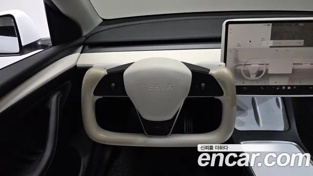 Tesla Model Y — Фото автомобиля 19