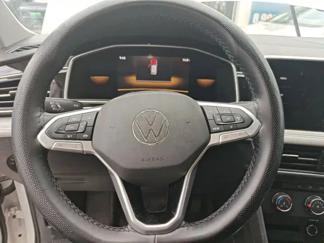 Volkswagen Tiguan L — Фото автомобиля 10